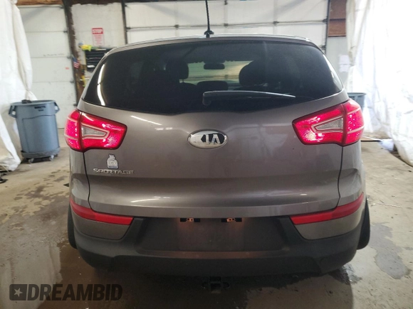 2013 Kia Sportage LX с VIN KNDPBCA23D7504226, выставлен на аукционе Copart как лот 63759715 с пробегом 89 883 миль миль и Списание • Salvage title. История ставок и продаж доступна на DreamBid. Изображение 6.