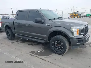 2018 Ford F-150 XL with VIN 1FTEW1EP4JKD45070, listed as a IAAI auction lot 42648874 with 140,424 mi miles and . Bid and sale history available at DreamBid. Image 1.