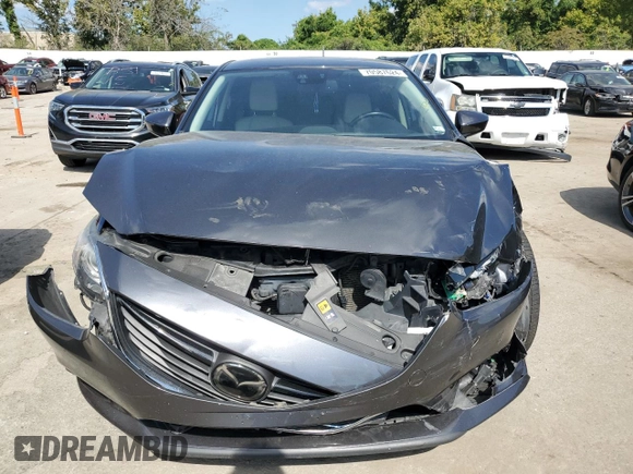 2014 Mazda 6 i Grand Touring с VIN JM1GJ1W67E1135264, выставлен на аукционе Copart как лот 70587624 с пробегом 86 926 миль миль и Списание • Salvage title. История ставок и продаж доступна на DreamBid. Изображение 5.