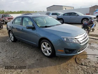 2012 Ford Fusion SE with VIN 3FAHP0HAXCR312560, listed as a Copart auction lot 53553765 with 184,302 mi miles and Non repairable. Bid and sale history available at DreamBid. Image 4.