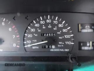 1993 Toyota T100 z VIN JT4VD10C0P0009821, wystawiony jako IAAI lot #41788269 z przebiegiem 144 505 mil mil oraz . Historia ofert i sprzedaży dostępna na DreamBid. Obrazek 7.