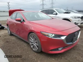 2019 Mazda 3 Premium with VIN 3MZBPAEM6KM103409, listed as a Copart auction lot 51947795 with 100,986 mi miles and Salvage Title. Bid and sale history available at DreamBid. Image 4.