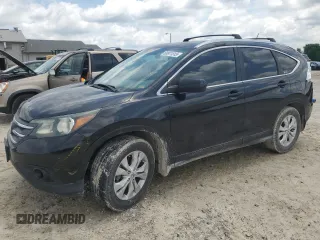 2012 Honda CR-V EX-L with VIN JHLRM4H79CC016563, listed as a Copart auction lot 60911315 with 209,971 mi miles and Salvage title. Bid and sale history available at DreamBid. Image 1.