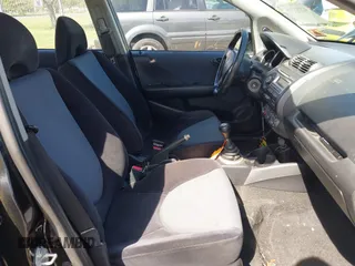 2007 Honda Fit Sport with VIN JHMGD37677S027417, listed as a IAAI auction lot 42155718 with 262,609 mi miles and . Bid and sale history available at DreamBid. Image 5.