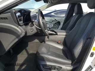 2023 Toyota Mirai XLE with VIN JTDAAAAA4PA009853, listed as a Copart auction lot 51687695 with 27,638 mi miles and Salvage Title. Bid and sale history available at DreamBid. Image 7.