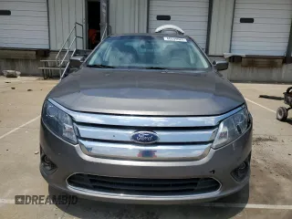 2010 Ford Fusion SE with VIN 3FAHP0HA4AR387638, listed as a Copart auction lot 60649585 with 210,779 mi miles and Salvage title. Bid and sale history available at DreamBid. Image 5.