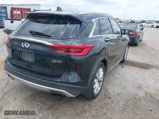 2019 Infiniti QX50 LUXE with VIN 3PCAJ5M35KF100862, listed as a IAAI auction lot 42117385 with 81,089 mi miles. Bid and sale history available at carsss.com. Image 4.