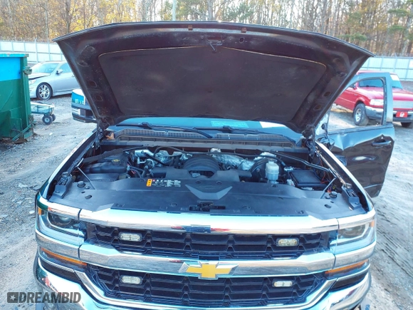 2018 Chevrolet Silverado 1500 LT with VIN 1GCVKREC1JZ292441, listed as a IAAI auction lot 41074213 with 146,607 mi miles. Bid and sale history available at carsss.com. Image 10.