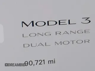 2019 Tesla Model 3 Long Range with VIN 5YJ3E1EBXKF512710, listed as a IAAI auction lot 42063737 with 90,721 mi miles and . Bid and sale history available at DreamBid. Image 16.