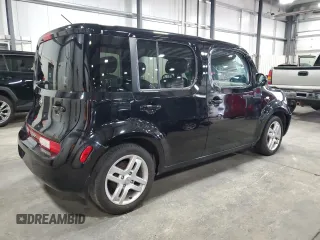 2009 Nissan Cube SL z VIN JN8AZ28R19T103579, wystawiony jako Copart lot #52356245 z przebiegiem 163 699 mil mil oraz Szkody całkowita. Historia ofert i sprzedaży dostępna na DreamBid. Obrazek 3.