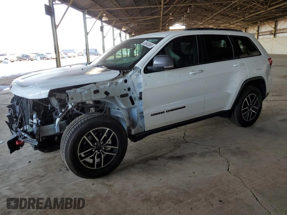 2020 Jeep Grand Cherokee Trailhawk with VIN 1C4RJFLGXLC400313, listed as a Copart auction lot 53649565 with 51,717 mi miles and Salvage title. Bid and sale history available at DreamBid. Image 1.