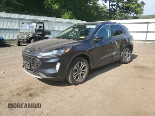 2021 Ford Escape SEL Hybrid z VIN 1FMCU9CZ7MUA94260, wystawiony jako Copart lot #71013514 z przebiegiem Nie podano mil oraz Szkoda całkowita • Salvage title. Historia ofert i sprzedaży dostępna na DreamBid. Obrazek 1.