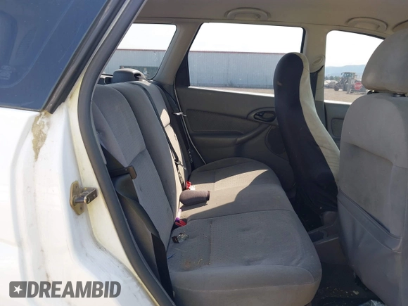 2003 Ford Focus SE Fleet z VIN 1FAFP36393W343129, wystawiony jako IAAI lot #42440063 z przebiegiem 184 413 mil mil oraz . Historia ofert i sprzedaży dostępna na DreamBid. Obrazek 8.