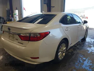 2013 Lexus ES 300h Hybrid with VIN JTHBW1GG4D2036539, listed as a IAAI auction lot 42121701 with 157,855 mi miles. Bid and sale history available at carsss.com. Image 4.
