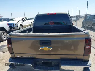 2014 Chevrolet Silverado 1500 LT with VIN 3GCPCREC0EG168589, listed as a IAAI auction lot 42001234 with 133,880 mi miles and . Bid and sale history available at DreamBid. Image 16.