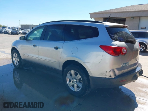 2012 Chevrolet Traverse 1LT with VIN 1GNKRGED5CJ370286, listed as a IAAI auction lot 40425141 with 125,280 mi miles and . Bid and sale history available at DreamBid. Image 3.