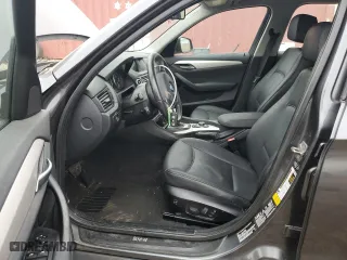 2015 BMW X1 xDrive28i with VIN WBAVL1C52FVY26870, listed as a Copart auction lot 43710555 with 0 mi miles and Salvage Title. Bid and sale history available at carsss.com. Image 7.