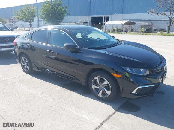 2019 Honda Civic Sedan LX with VIN 2HGFC2F61KH561199, listed as a IAAI auction lot 41754093 with 43,779 mi miles. Bid and sale history available at carsss.com. Image 1.