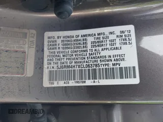 2012 Honda CR-V EX-L with VIN 5J6RM4H7XCL063785, listed as a IAAI auction lot 42601666 with Not provided miles and . Bid and sale history available at DreamBid. Image 9.