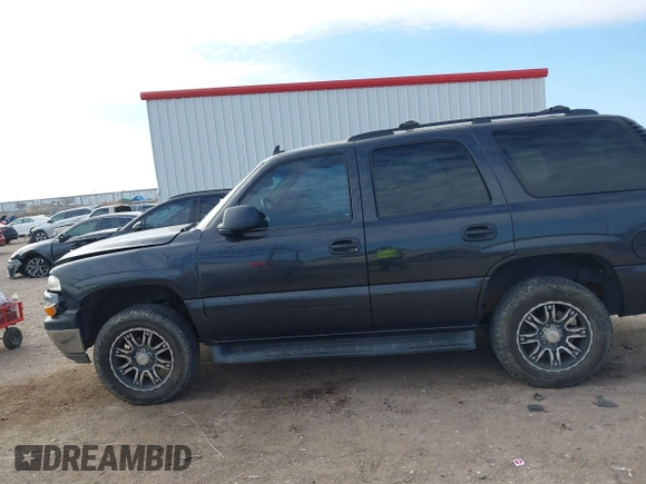 2006 Chevrolet Tahoe LS with VIN 1GNEC13V16J163907, listed as a IAAI auction lot 41232903 with 142,382 mi miles. Bid and sale history available at carsss.com. Image 14.