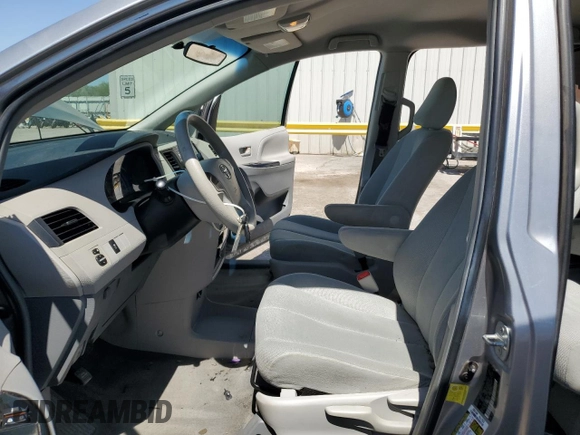2012 Toyota Sienna with VIN 5TDZK3DC8CS246285, listed as a Copart auction lot 61676185 with 114,700 mi miles and Salvage title. Bid and sale history available at DreamBid. Image 7.
