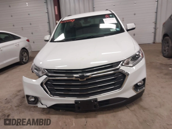 2021 Chevrolet Traverse LT Cloth with VIN 1GNEVGKW8MJ189876, listed as a IAAI auction lot 41719747 with 60,916 mi miles. Bid and sale history available at carsss.com. Image 12.