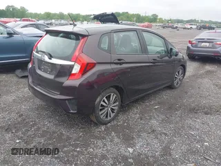 2015 Honda Fit EX-L z VIN 3HGGK5H81FM757562, wystawiony jako IAAI lot #42177050 z przebiegiem 217 618 mil mil oraz . Historia ofert i sprzedaży dostępna na DreamBid. Obrazek 4.