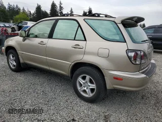 2002 Lexus RX 300 z VIN JTJHF10U820277506, wystawiony jako Copart lot #58133015 z przebiegiem 236 003 mil mil oraz Tytuł czysty. Historia ofert i sprzedaży dostępna na DreamBid. Obrazek 2.