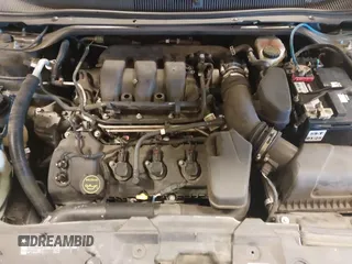 2015 Ford Taurus SEL with VIN 1FAHP2H80FG133240, listed as a IAAI auction lot 41897873 with 189,059 mi miles. Bid and sale history available at carsss.com. Image 10.