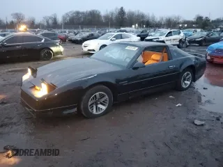 1990 Pontiac Firebird z VIN 1G2FS23TXLL205077, wystawiony jako Copart lot #44035705 z przebiegiem 142 809 mil mil oraz Szkoda całkowita • Salvage title. Historia ofert i sprzedaży dostępna na DreamBid. Obrazek 1.