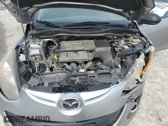 2014 Mazda 2 Touring z VIN JM1DE1LY5E0176964, wystawiony jako Copart lot #48875405 z przebiegiem 128 264 mil mil oraz Szkoda całkowita • Salvage title. Historia ofert i sprzedaży dostępna na DreamBid. Obrazek 11.