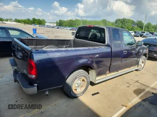 1999 Ford F-150 with VIN 1FTZX1729XNB58298, listed as a Copart auction lot 62369755 with 165,150 mi miles and Clean title. Bid and sale history available at DreamBid. Image 3.
