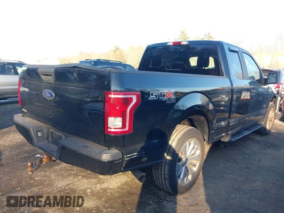 2017 Ford F-150 XL with VIN 1FTEX1EPXHFC22504, listed as a IAAI auction lot 41256497 with 148,434 mi miles. Bid and sale history available at carsss.com. Image 4.