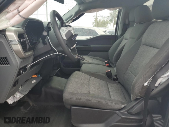 2021 Ford F-150 XL z VIN 1FTMF1E5XMKE93125, wystawiony jako Copart lot #79877134 z przebiegiem 61 418 mil mil oraz Nie do naprawy • Non repairable. Historia ofert i sprzedaży dostępna na DreamBid. Obrazek 7.