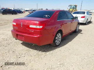 2007 Lincoln MKZ with VIN 3LNHM26TX7R640386, listed as a IAAI auction lot 41794717 with 166,907 mi miles. Bid and sale history available at carsss.com. Image 4.