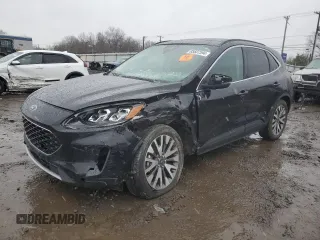 2020 Ford Escape Titanium Hybrid z VIN 1FMCU0DZ9LUA84807, wystawiony jako Copart lot #85507594 z przebiegiem Nie podano mil oraz Szkoda całkowita • Salvage title. Historia ofert i sprzedaży dostępna na DreamBid. Obrazek 1.