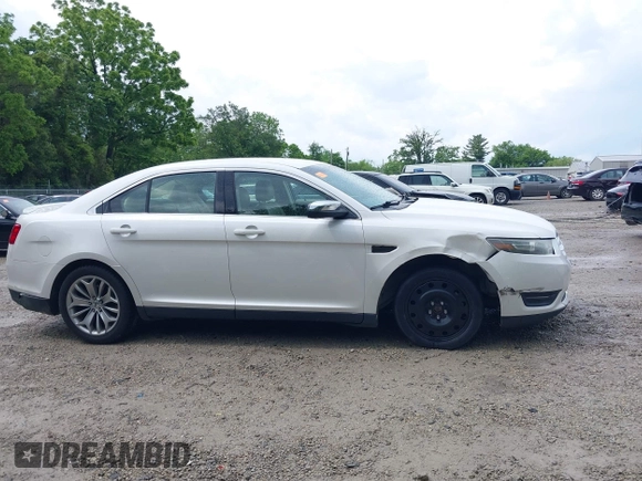 2014 Ford Taurus Limited with VIN 1FAHP2F82EG121267, listed as a IAAI auction lot 42377620 with 123,199 mi miles and . Bid and sale history available at DreamBid. Image 14.