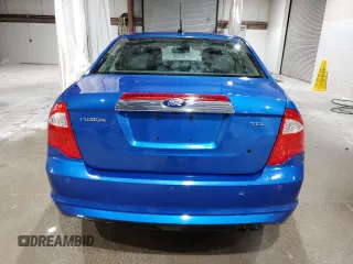 2012 Ford Fusion SEL z VIN 3FAHP0JA5CR210559, wystawiony jako Copart lot #55126185 z przebiegiem 130 990 mil mil oraz Szkody całkowita. Historia ofert i sprzedaży dostępna na DreamBid. Obrazek 6.