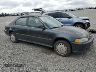 1994 Honda Civic LX z VIN JHMEG8653RS014056, wystawiony jako Copart lot #67393264 z przebiegiem 171 465 mil mil oraz Nie do naprawy • Non repairable. Historia ofert i sprzedaży dostępna na DreamBid. Obrazek 4.
