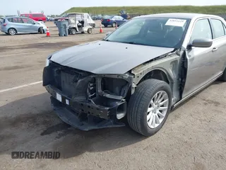 2014 Chrysler 300 with VIN 2C3CCAAG3EH322855, listed as a IAAI auction lot 42053129 with 172,687 mi miles. Bid and sale history available at carsss.com. Image 6.