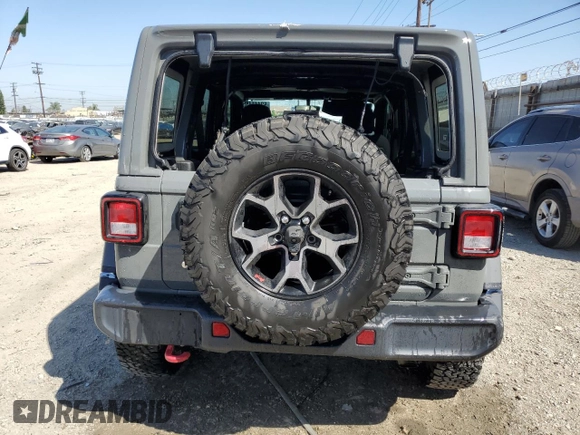 2019 Jeep Wrangler Unlimited Rubicon with VIN 1C4HJXFN1KW502477, listed as a Copart auction lot 52441455 with 53,110 mi miles and Salvage title. Bid and sale history available at DreamBid. Image 6.