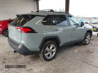 2021 Toyota RAV4 Hybrid LE with VIN 4T3B6RFV3MU010280, listed as a IAAI auction lot 41518724 with 48,916 mi miles. Bid and sale history available at carsss.com. Image 4.