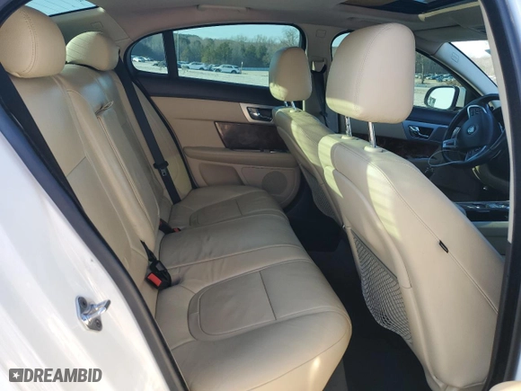 2015 Jaguar XF I4 T Premium with VIN SAJWA0FS5FPU58943, listed as a Copart auction lot 46973695 with 98,011 mi miles and Salvage Title. Bid and sale history available at carsss.com. Image 10.