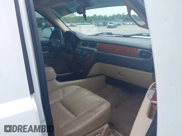2007 Chevrolet Tahoe LTZ with VIN 1GNFC13J47J336516, listed as a IAAI auction lot 42545424 with 211,669 mi miles and . Bid and sale history available at DreamBid. Image 5.