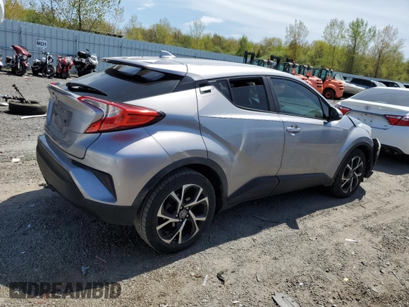 2018 Toyota C-HR XLE z VIN NMTKHMBX8JR001011, wystawiony jako Copart lot #55469265 z przebiegiem 106 938 mil mil oraz Szkoda całkowita • Salvage title. Historia ofert i sprzedaży dostępna na DreamBid. Obrazek 3.