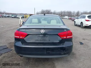 2012 Volkswagen Passat SE with VIN 1VWBP7A37CC021336, listed as a IAAI auction lot 41724459 with 124,832 mi miles. Bid and sale history available at carsss.com. Image 15.