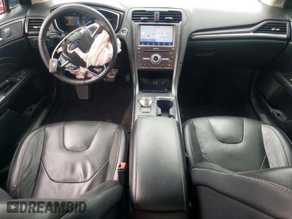 2019 Ford Fusion Titanium z VIN 3FA6P0D99KR221328, wystawiony jako Copart lot #57104515 z przebiegiem 138 427 mil mil oraz Szkoda całkowita • Salvage title. Historia ofert i sprzedaży dostępna na DreamBid. Obrazek 8.