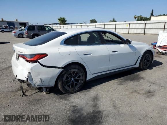2022 BMW i4 eDrive40 with VIN WBY73AW09NFM42460, listed as a Copart auction lot 59141474 with 0 mi miles and Salvage Title. Bid and sale history available at carsss.com. Image 3.