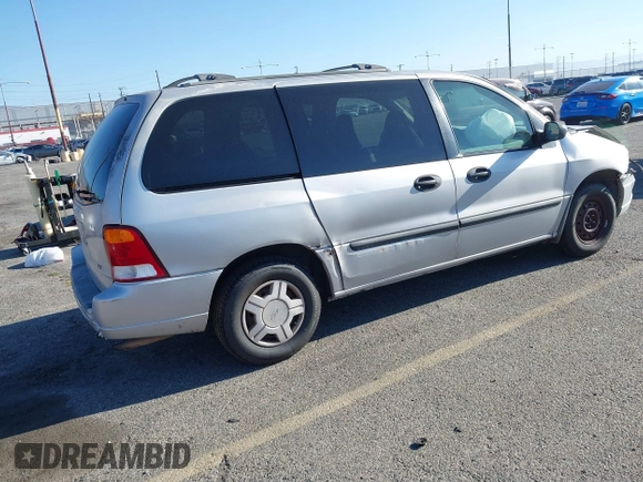 2003 Ford Windstar LX with VIN 2FMZA51413BA16113, listed as a IAAI auction lot 41850359 with 128,768 mi miles and . Bid and sale history available at DreamBid. Image 4.