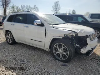 2020 Jeep Grand Cherokee Overland with VIN 1C4RJFCG4LC398526, listed as a Copart auction lot 54221205 with 122,046 mi miles and Salvage Title. Bid and sale history available at DreamBid. Image 4.